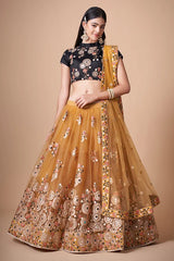 Gold Color Exquisite Soft Net Embellished Lehenga Choli For Festive Fervor