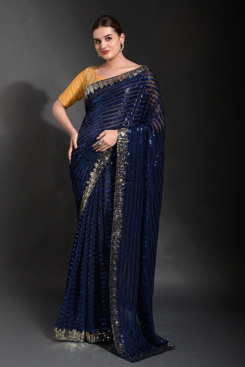 Blue georgette saree with cut-work embroidery
