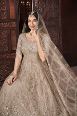 Long embroidered gown with festive design