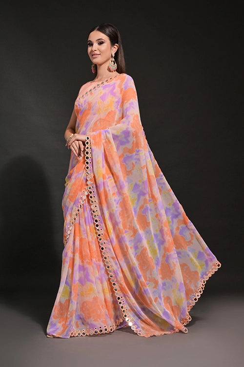 Heavy saree with mirror work
