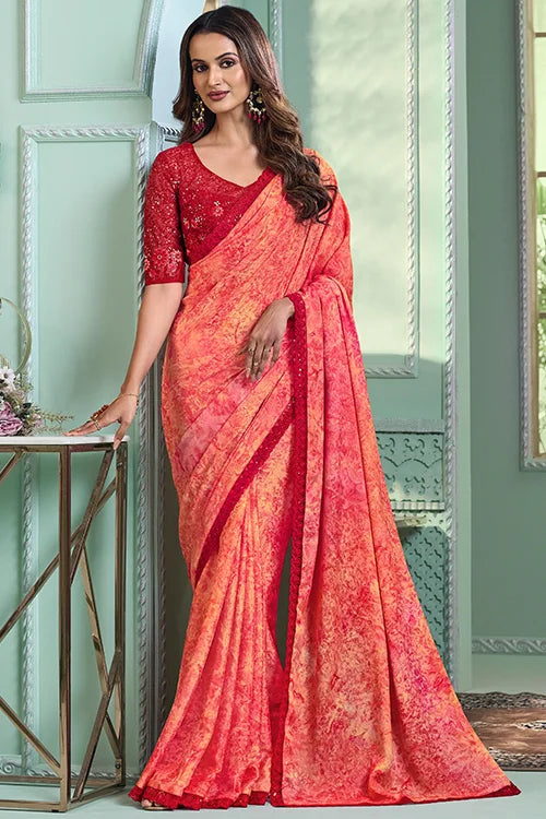 Orange Chiffon Saree with Heavy Embroidered Blouse